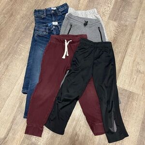 Six pairs of Boys Size 4 pants.